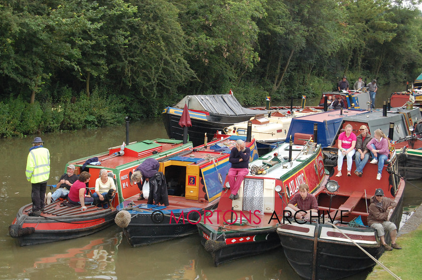 Braunston rally 2014 (77) 
 Please enjoy our album of photos from the Braunston Historic Narrowboat Rally and Canal Festival over the weekend of June 28-29, 2014. The annual event at Braunston Marina was preceded by a Centennial Tribute to the Fallen of Braunston in the First World War which took place at Braunston War Memorial and was led by the Rev Sarah Brown with readings by Timothy West and Prunella Scales. Visitors to the rally also included Canal & River Trust chairman Tony Hales on Saturday and chief executive Richard Parry on Sunday. 
 Keywords: 2014, Braunston Rally, June, Mortons Archive, Mortons Media Group Ltd, Towpath Talk