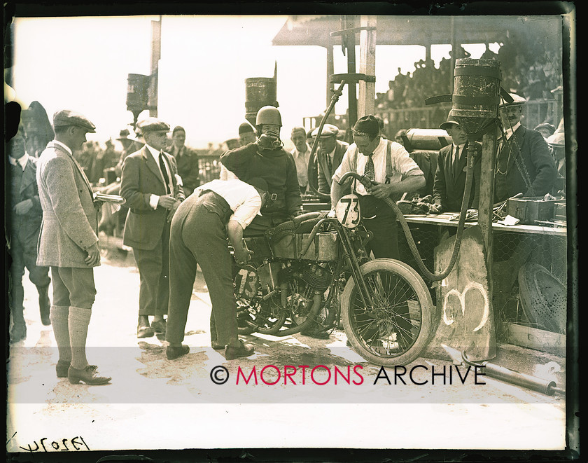 036 brooklands 01 
 Bert Le Vack and the Brough both take on fuel. 
 Keywords: June 2011, Mortons Archive, Mortons Media Group, Straight from the plate, The Classic MotorCycle