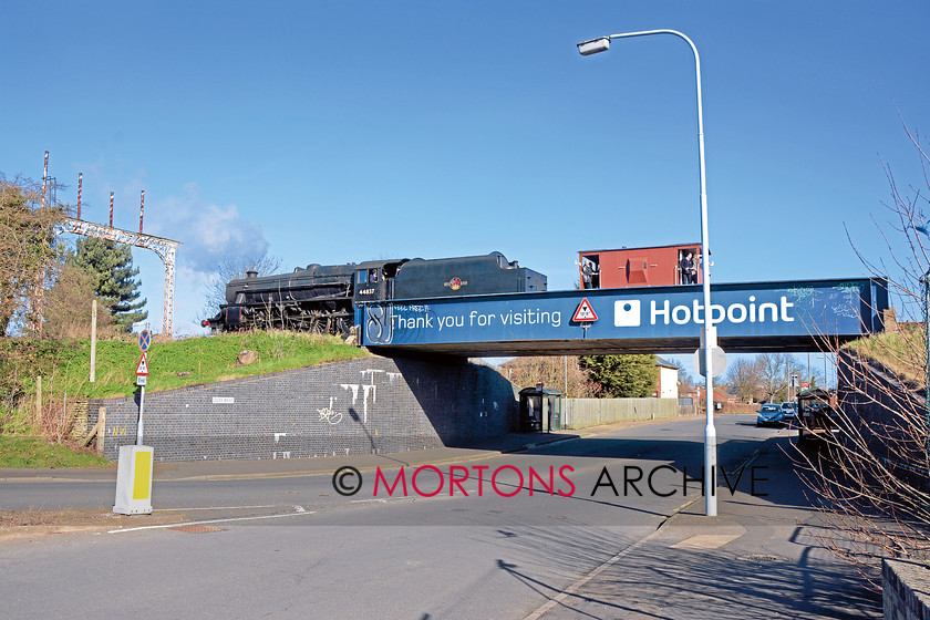 000 44837 Woodston 
 Right: On the Fletton branch, LMS ‘Black Five’ 4-6-0 No. 45337 running as No. 44837 crosses Celta Road bridge outside the Hotpoint factory in Woodston. BRIAN SHARPE