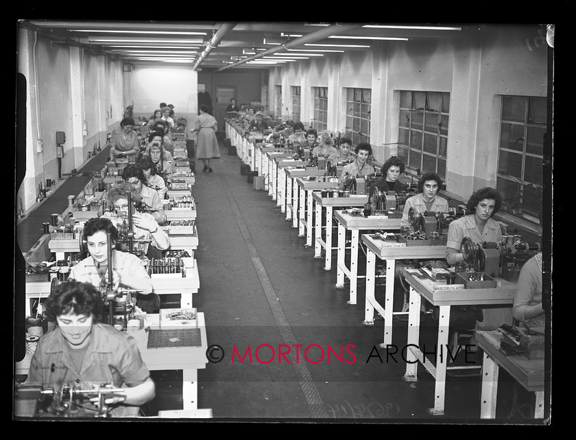 19674-14 
 Villiers engineering, Wolverhampton. General view of coil winding section. 
 Keywords: 1959, 19674-14, August 2009, coil winding, engine, glass plate, Mortons Archive, Mortons Media, Mortons Media Group Ltd., production, scooter, scooter engine production, Straight from the plate, The Classic MotorCycle, villiers, villiers engineering, wolverhampton