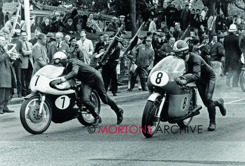 Agostini-011 
 From the Nick Nicholls Collection No. 7 Derek Minter (Norton) and No. 8 Giacomo Agostini (MV-3) at the 1965 Isle of Man Senior TT start.