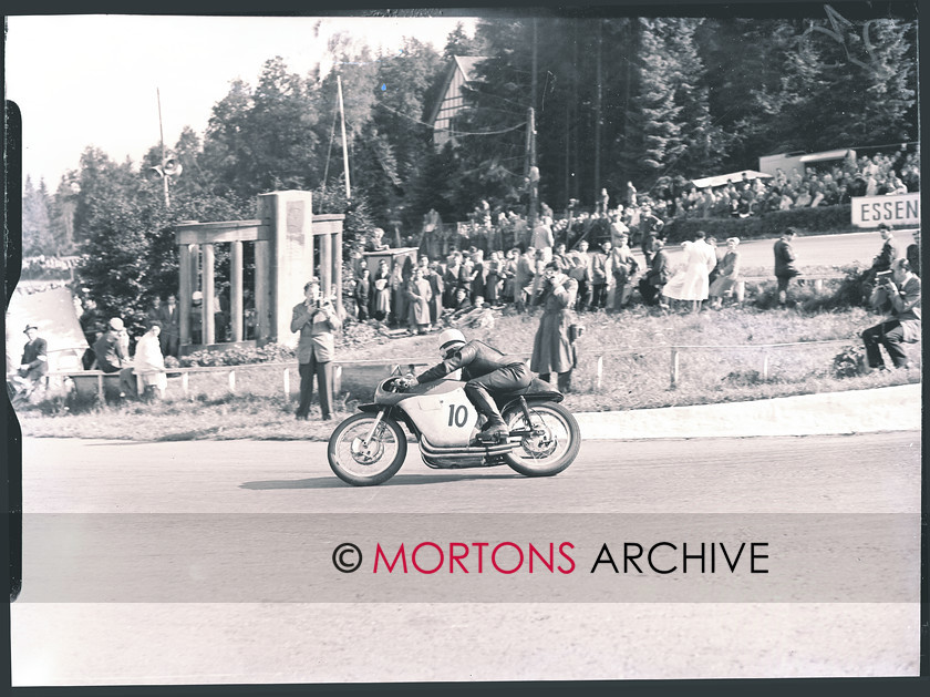 062 SFTP AUG1 
 The master stylist Geoff Duke, on the four-cylinder Gilera. He raced to his first 'classic' victory of what was to be a world championship year. 
 Keywords: 1954 Belgian 500cc Grand Prix, August 2011, Mortons Archive, Mortons Media Group, Straight from the plate, The Classic MotorCycle