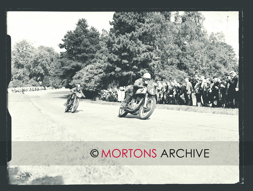 SFTP April 2012 - 12 
 Ron Jerrard (4, Norton), who finished second in the 1956 Senior Clubman's TT on a Gold Star, leads AJS-mounted Fred Wallos, 'The King of Cadwell' who rode solo and sidecar TT. 
 Keywords: 2010, Aberdare road races 1954, April, Mortons Archive, Mortons Media Group, Straight from the plate, The Classic MotorCycle