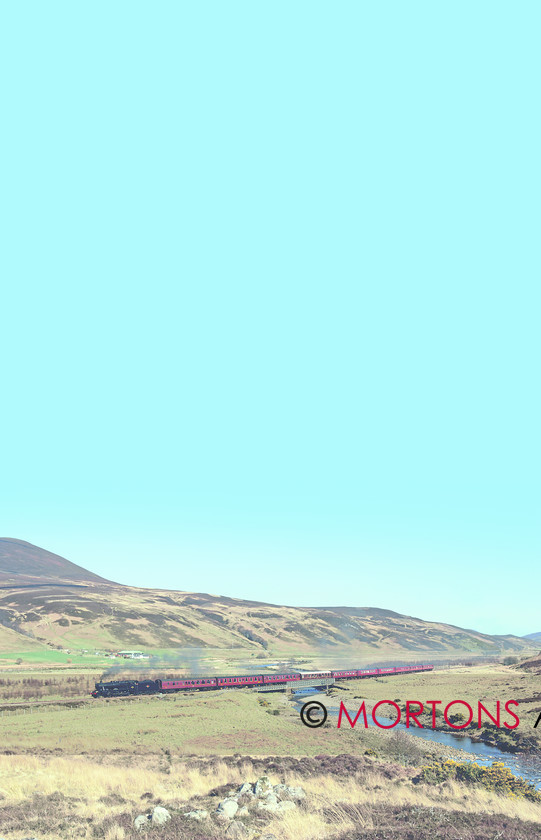 48151Kinbrace 
 LMS 8F 2-8-0 No 48151 is on the Far North line at Kinbrace en route for Thurso with the 'Great Britain.' 
 Keywords: Heritage Railway, Mortons Archive, Mortons Media Group