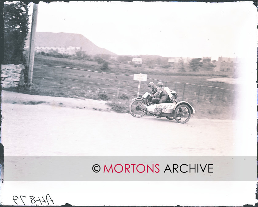 062 FROM THE PLATE 01 
 'Pa' Cowley, aged 61, hustles the 350cc Sunbeam through Cruickshank Corner. D Cowley - no relation to the son of the Manx policeman - was in the chair. 
 Keywords: 1925 Sidecar TT, 2011, December, Mortons Archive, Mortons Media Group, Sidecars, Straight from the plate, The Classic MotorCycle