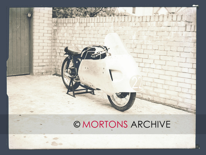 SFTP TT Practice 1957 01 
 Dennis Christian's AJS 7R, prepared and ready for action. Dennis raced it ti a praiseworthy 11th place in the Junior race. 
 Keywords: 1957 Practice TT, Issue, Mortons Archive, Mortons Media Group, October 2011, Straight from the plate, The Classic MotorCycle