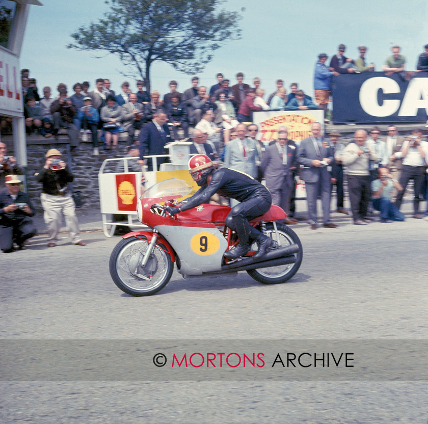 Ago IOM 001 
 Ready for the off on the start line of the 1967 Senior TT, Agostini. 
 Keywords: 1967 Senior TT, Giacomo Agostini, Isle of Man, Mortons Archive, Mortons Media Group, Nick Nicholls