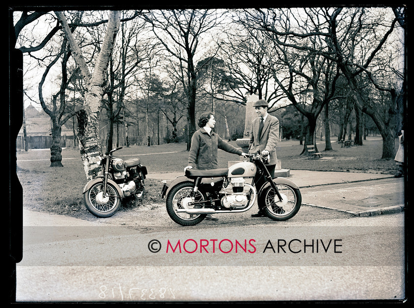 SFTP 18 
 AJS and Matchless lightweight singles - June Lines, wife of Sussex dealer Harold LInes and a regular grass track and scrambles competior, poses with the newcomers. 
 Keywords: 2012, AJS, August, Matchless, Mortons Archive, Mortons Media Group, Straight from the plate, The Classic MotorCycle