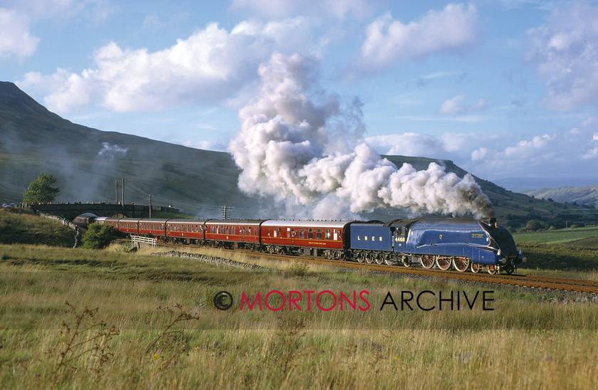 WD594819@64 preservation 00 
 LNER A4 Pacific No. 4468 Mallard on its final working, a circular tour from Eaglesclife to York via the Settle to Carlisle topsAis Gill Summit on 27th August 1988, after stalling at Birkett Common due to a build-up of ash in the smokebox. 
 Keywords: Heritage Railway, Mortons Archive, Mortons Media Group