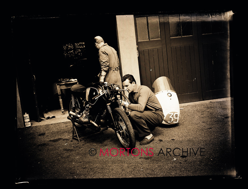 SFTP TT Practice 1957 14 
 A hive of activity in the Peel garages. 
 Keywords: 1957 Practice TT, Issue, Mortons Archive, Mortons Media Group, October 2011, Straight from the plate, The Classic MotorCycle