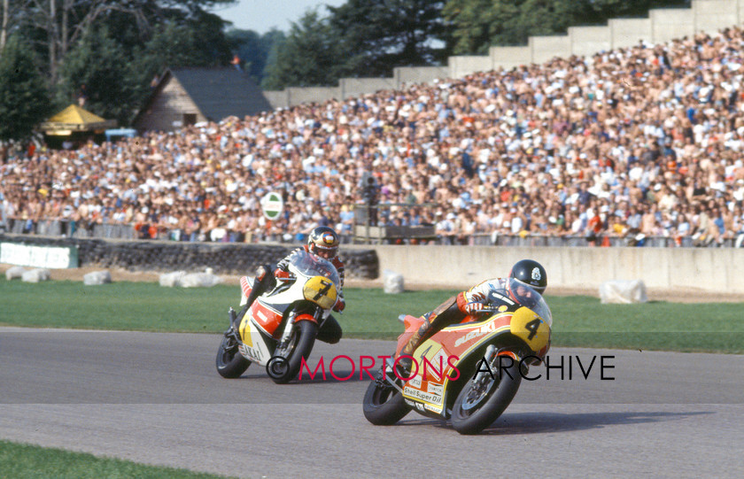 NNC 14 02 12 020 
 NNC 14 02 12 020 - No. 4 Graeme Crosby - 500cc Suzuki leads No. 7 Barry Sheene - 500cc Yamaha 
 Keywords: 1981, 50th Aniversary Race, Donington Park, Event, Mortons Archive, Mortons Media Group, Nick Nicholls