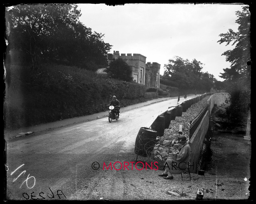 A6230 
 TT Junior/Lightweight 1926. George Reynard, one of the other Enfield teamsters, on his twin port model. 
 Keywords: 1926, a6230, glass plate, isle of mann, junior, lightweight, Mortons Archive, Mortons Media Group Ltd, Straight from the plate, the classic motorcycle