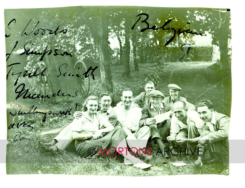 SFTP 06 
 1933 Belgian Grand Prix held at Spa Francorchamps - 'The Countinetal cicrus.' Riders and Friends including Stanley Woods (third from the left) and Jimmy Simpson (second right) in relaxed mood, while in the hats are Tyrell Smith and Charlie Manders (behind). 
 Keywords: 1933 Belgian GP, 2012, February, Glass plate, Mortons Archive, Mortons Media Group, Straight from the plate, The Classic MotorCycle