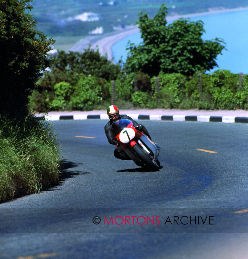 Agostini-028 
 From the Nick Nicholls Collection - Giacomo Agostini on the 500 MV3 at Waterworks in the 1968 Isle of Man Senior TT.