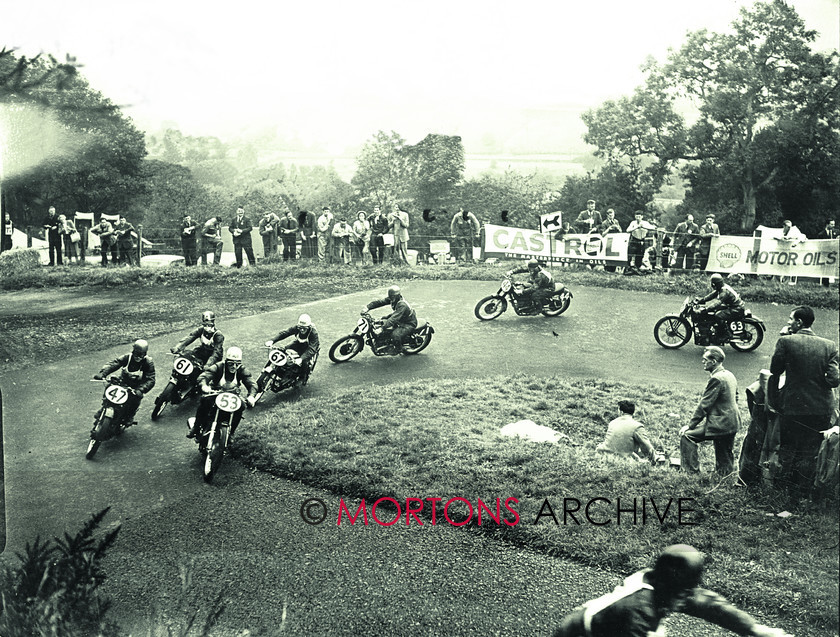 008 062 SFTP C25668 
 Bill Doran (AJS, 53) heads a field of 350cc runner. Others include Les Archer (Velocette, 61), Geoff Duke (Norton, 67), Syd Barnett (AJS, 71) and Dickie Dale (Velo, 63). 
 Keywords: 1949, May, Mortons Archive, Mortons Media Group, Oliver's Mount, Scarborough, Straight from the plate, The Classic MotorCycle