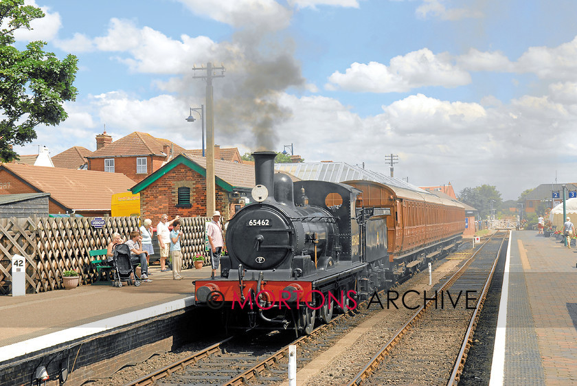 WD591372@HR140 next issue 2 
 In a sense so far unspoilt by yellow lines on platforms or the standard European Community notices to be found on hte main line system, GER J15 0-6-0 No 65462 leaves Sheringham during hte North Norfolk Railway's Quad-art-week. 
 Keywords: class 5MT, date February 2009, event ?, feature next issue, Heritage Railway, issue 140, item ?, make LMS, Mortons Archive, Mortons Media Group, number 5025, person(s) name ?, place Aviemore, publication HR