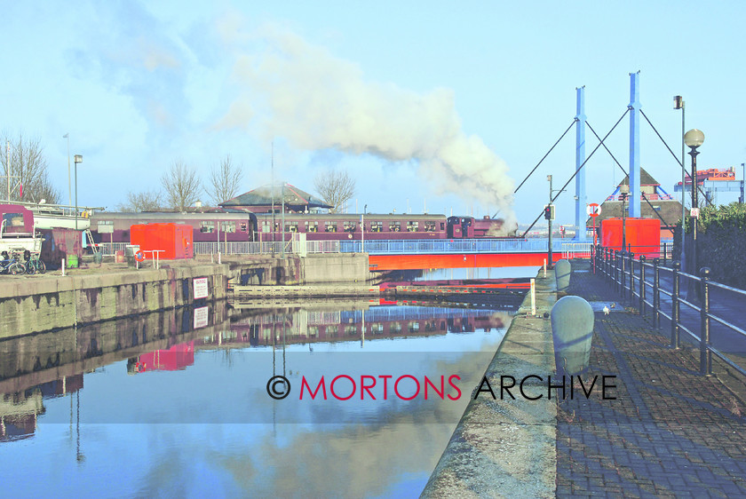 CumbriaRibble 
 Hunslet Austerity 0-6-OST Cumbria crosses the unique swing bridge on the Ribble Steam Railway. 
 Keywords: Heritage Railway, Mortons Archive, Mortons Media Group